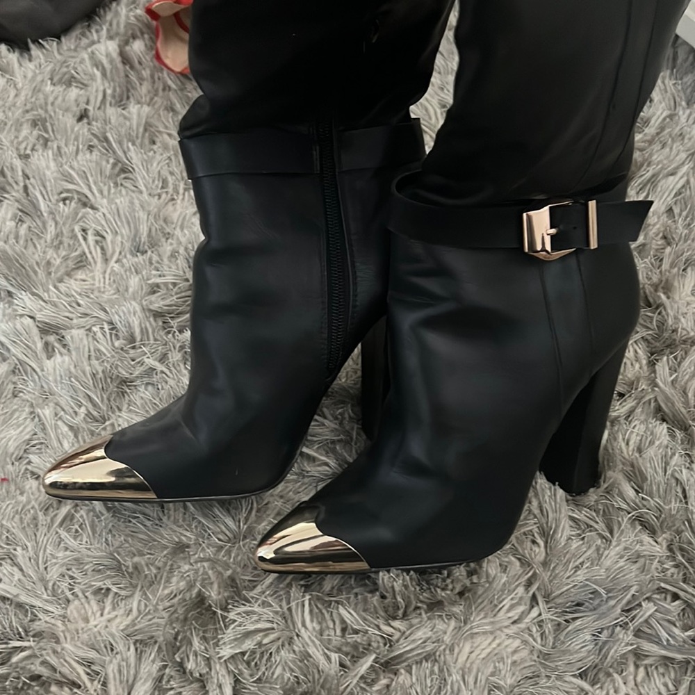 Over the knee black boots